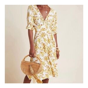 Faithful the Brand deep V-neck floral midi dress